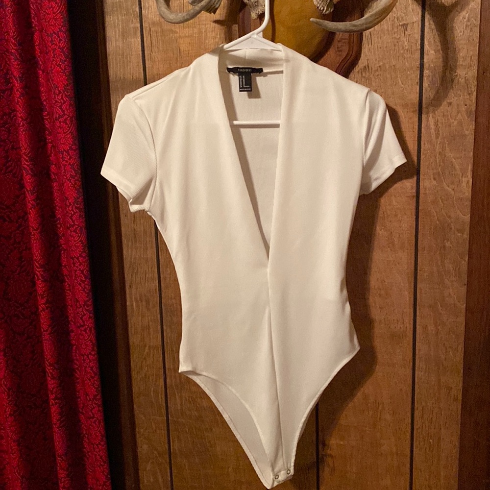 Cream colored bodysuit